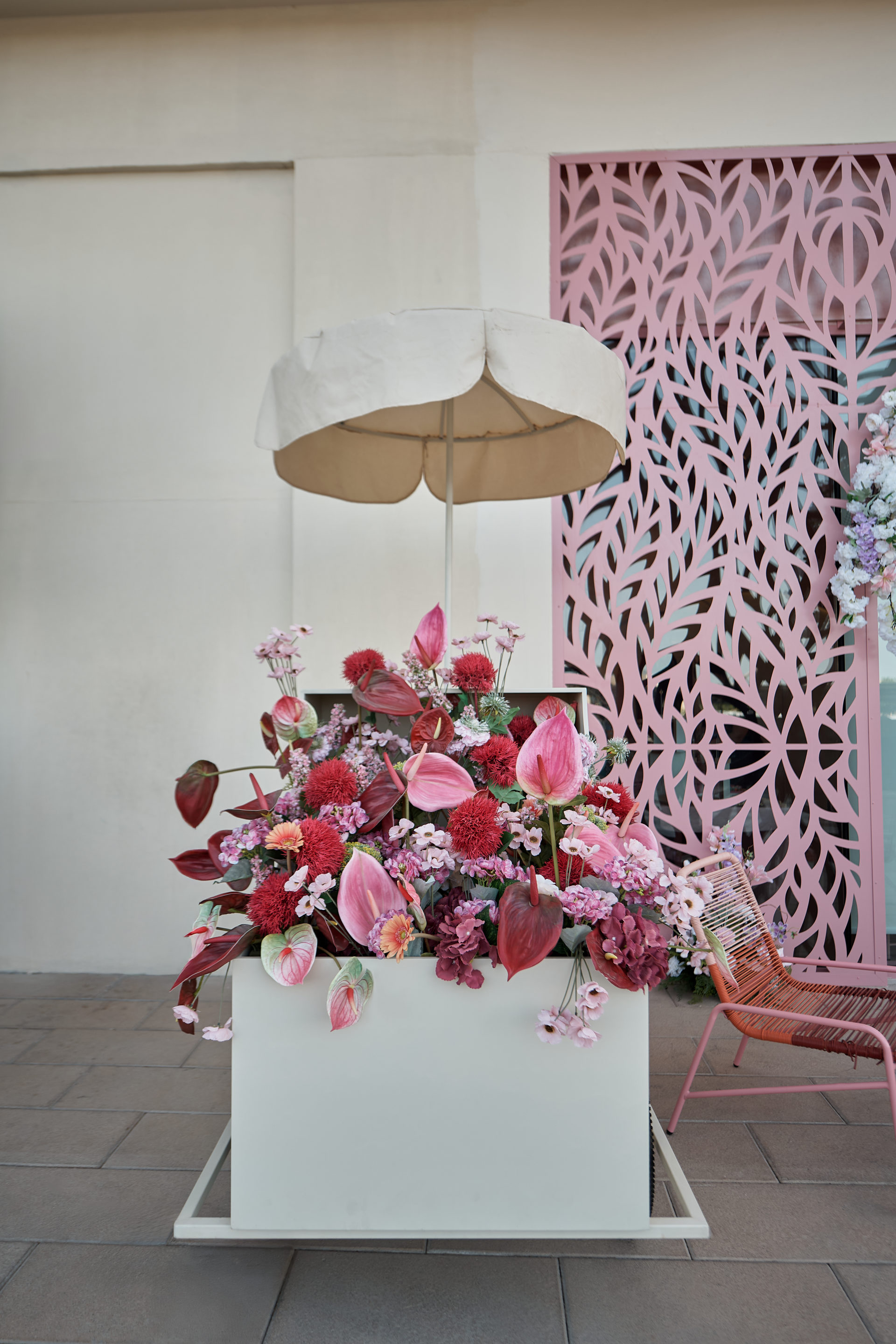 Flower Corner branded flower bar and guest giveaways at a Dubai brand activation — photo 369