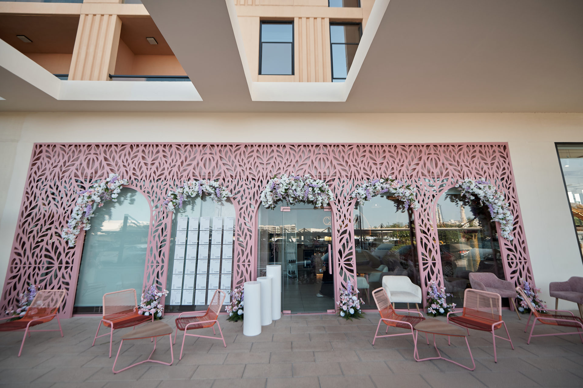 Flower Corner branded flower bar and guest giveaways at a Dubai brand activation — photo 370