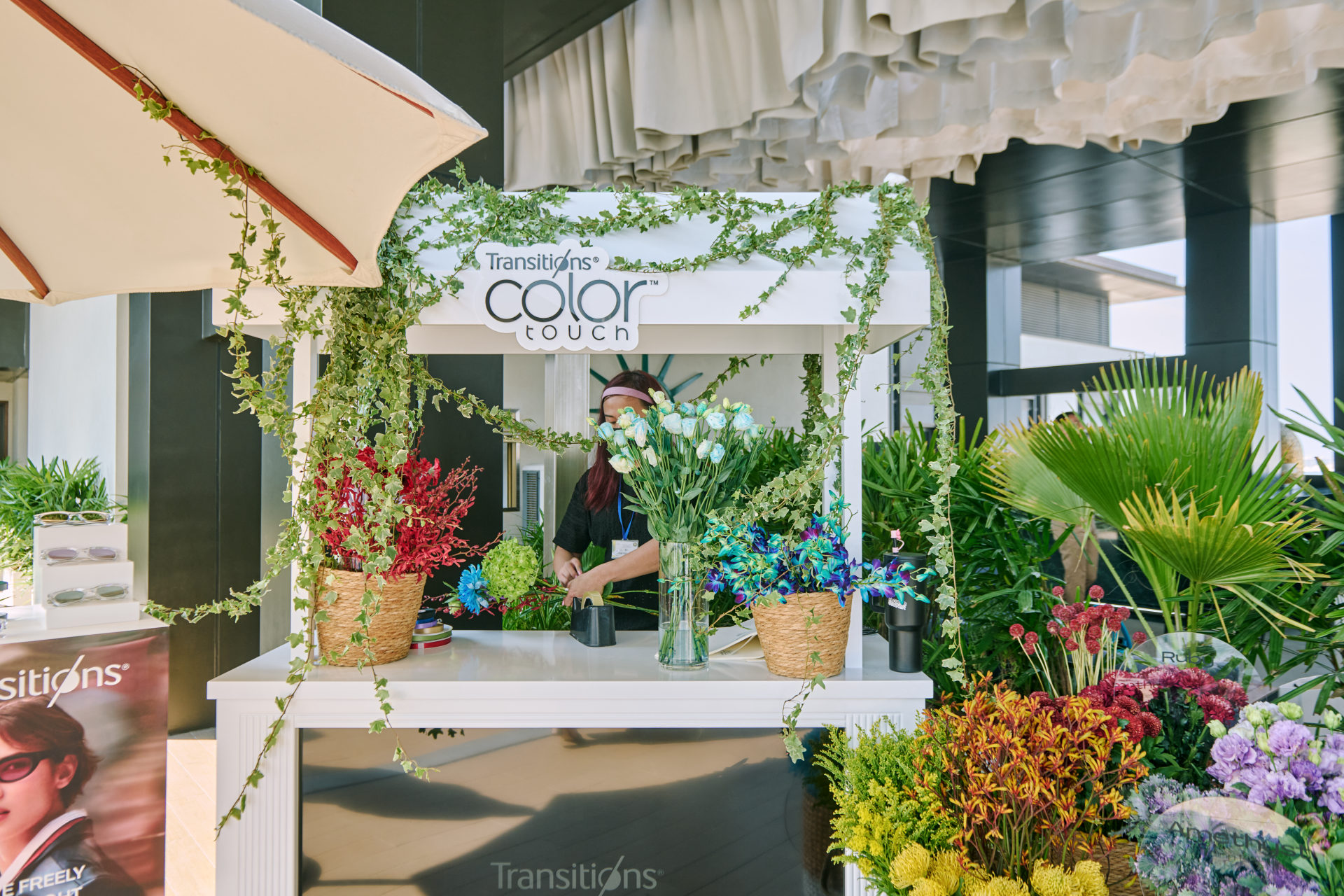 Flower Corner flower cart serving guests at a Dubai outdoor brand event — photo 713