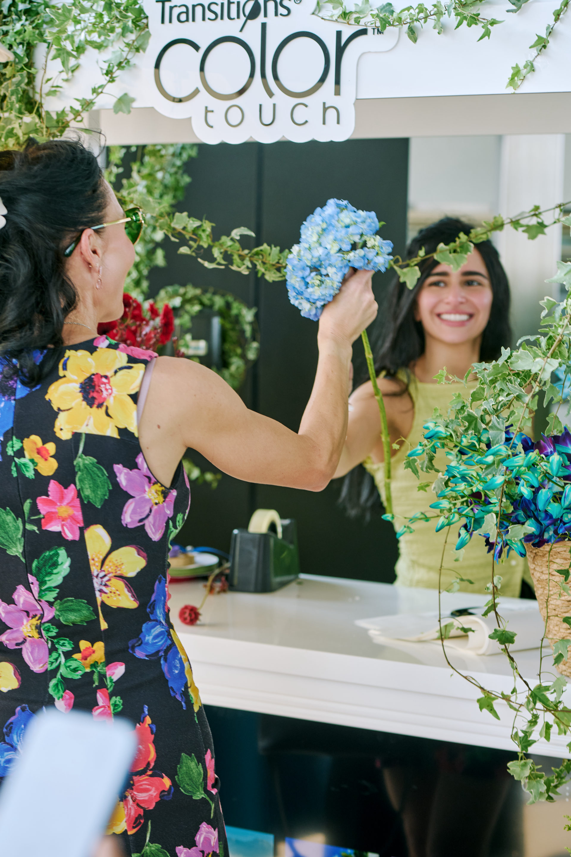 Flower Corner flower cart serving guests at a Dubai outdoor brand event — photo 802