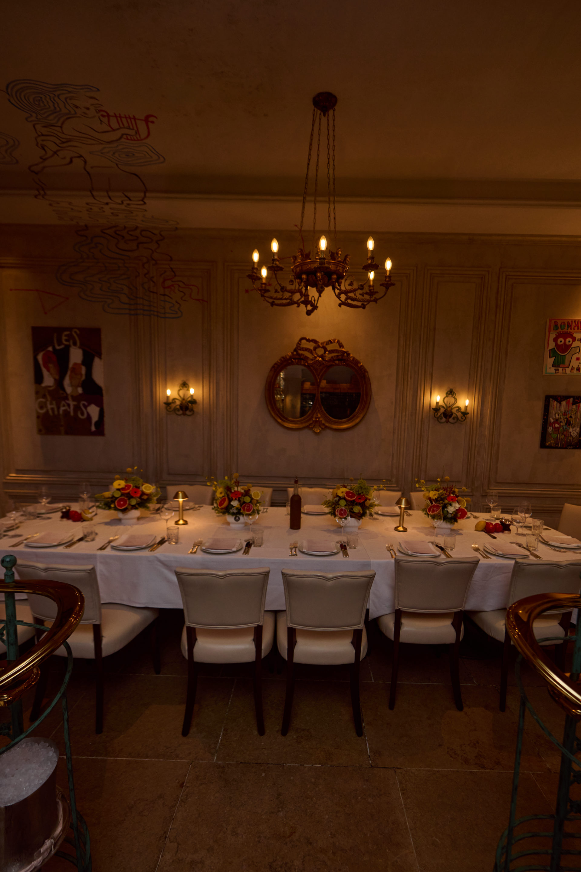 Citrus and wildflower centerpiece on a private dining table in Dubai, by Flower Corner — photo 358
